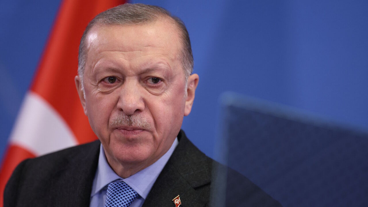 Turkey's President Recep Tayyip Erdogan addresses media representatives during a press conference at an European Union (EU) summit at EU Headquarters in Brussels on March 24, 2022. 