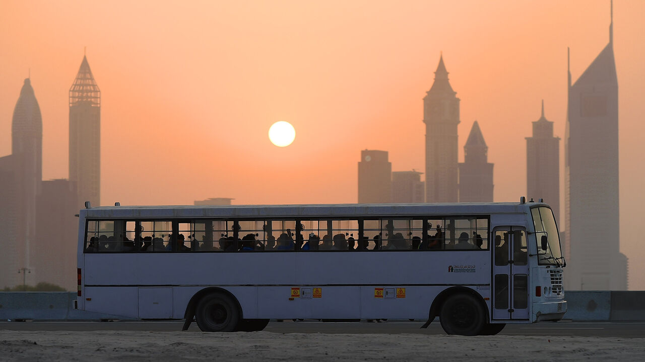 A bus is pictured carrying workers back from a construction site on Sept. 14, 2016, in Dubai, United Arab Emirates.