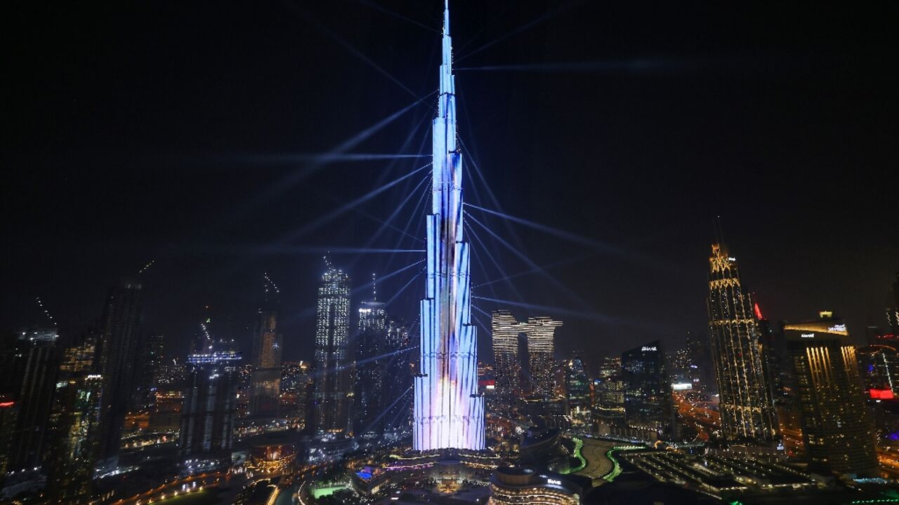 The launch of a rocket into space is projected on Dubai's Burj Khalifa on February 9, 2021 during the UAE's Al-Amal probe to Mars