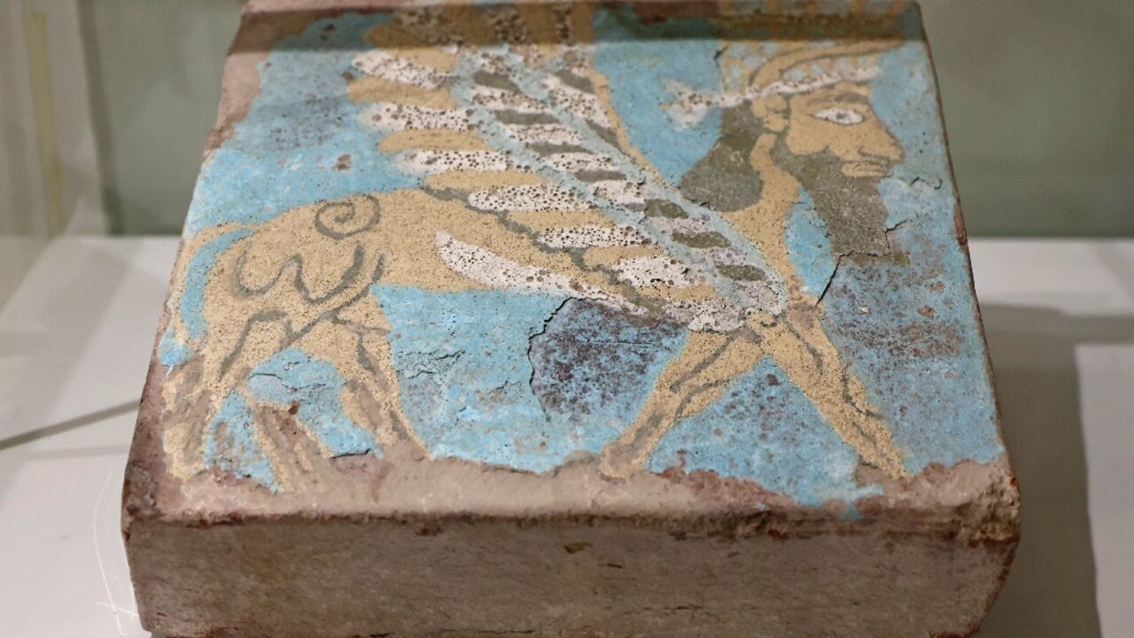 The 51 bricks are painted with a glazed coating on backgrounds of various colours The 51 bricks are painted with a glazed coating on backgrounds of various colours