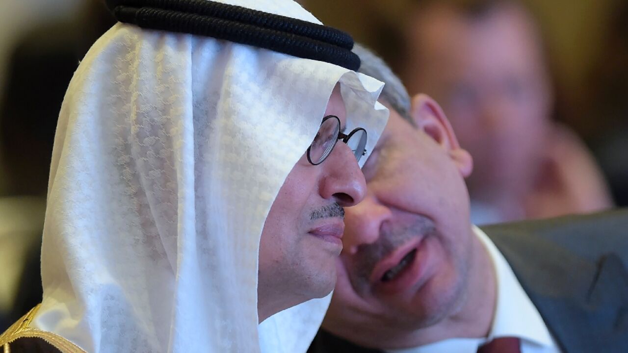 Saudi Energy Minister Abdulaziz bin Salman (L) and Iraqi Oil Minister Ihsan Abdul-Jabbar Ismail at  a Middle East energy conference in the Bahraini capital Manama