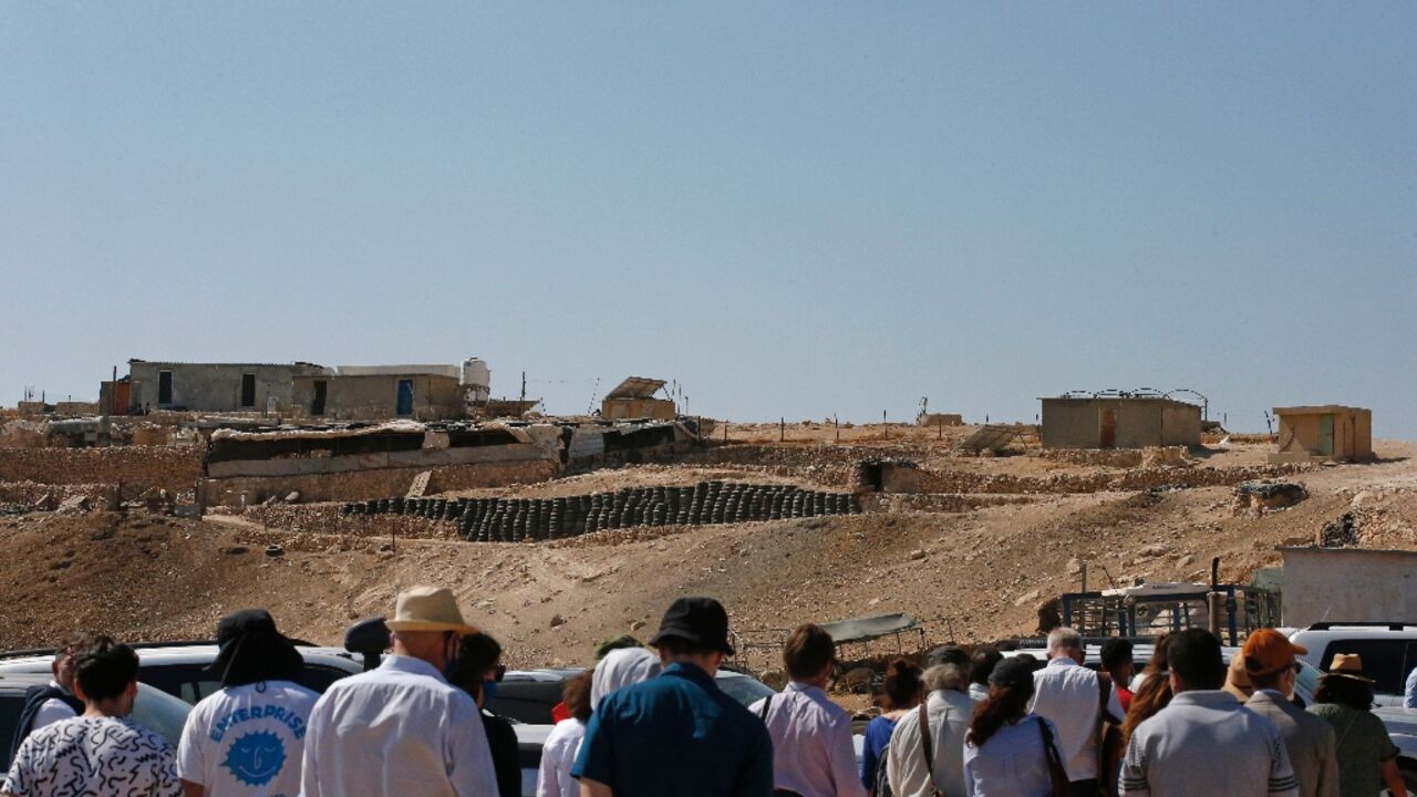 European Union officials and Israeli rights group representatives visit Palestinian communities in the Masafer Yatta area, in October 2020