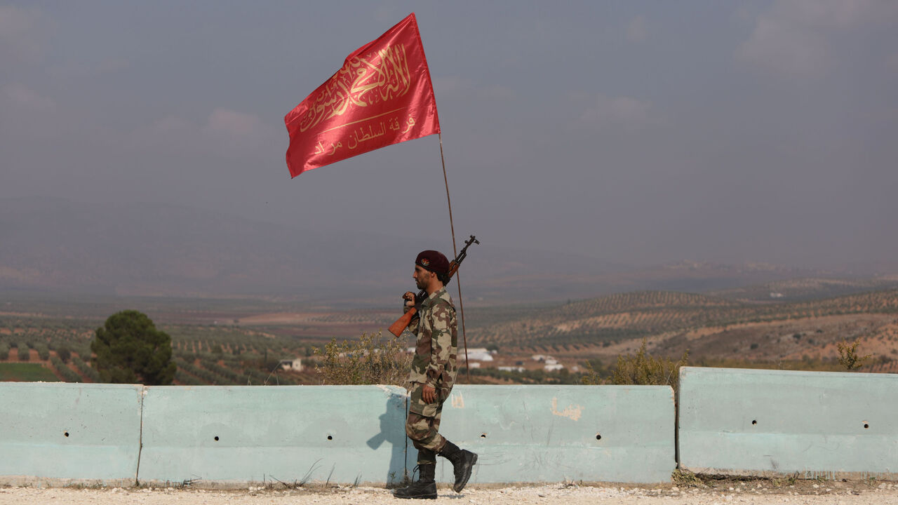 A Turkish-backed Syrian fighter of the Sultan Murad Turkoman brigade.