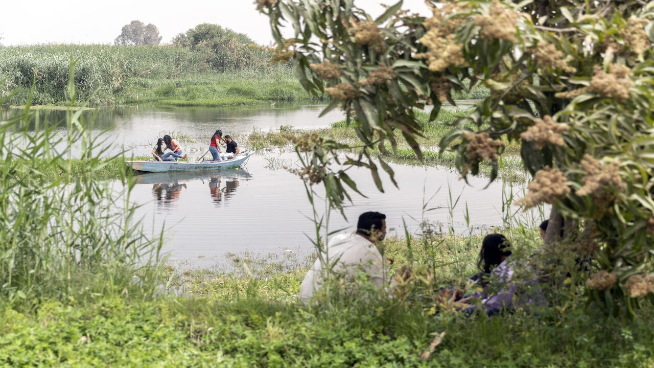 Coptic Christian families celebrate the Spring Festival known as Sham el-Nessim by the Nile banks in al-Barsha village, Egypt, April 25, 2022.