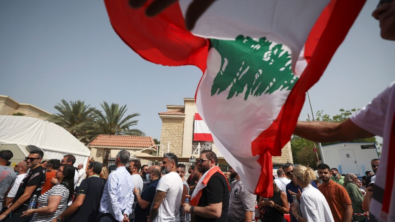 Lebanese expats queue to cast their votes for the May 15 legislative election at Lebanon's Consulate in the Gulf emirate of Dubai on May 8 