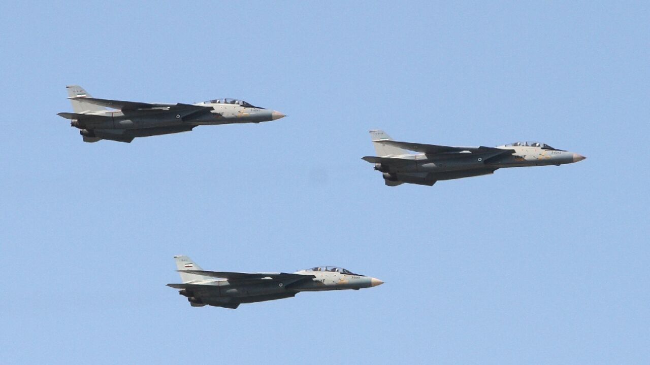 Iranian air force US-made F-14 fighter jets perform during a parade on the country's Army Day, on April 18, 2017, in Tehran Iranian air force US-made F-14 fighter jets perform during a parade on the country's Army Day, on April 18, 2017, in Tehran