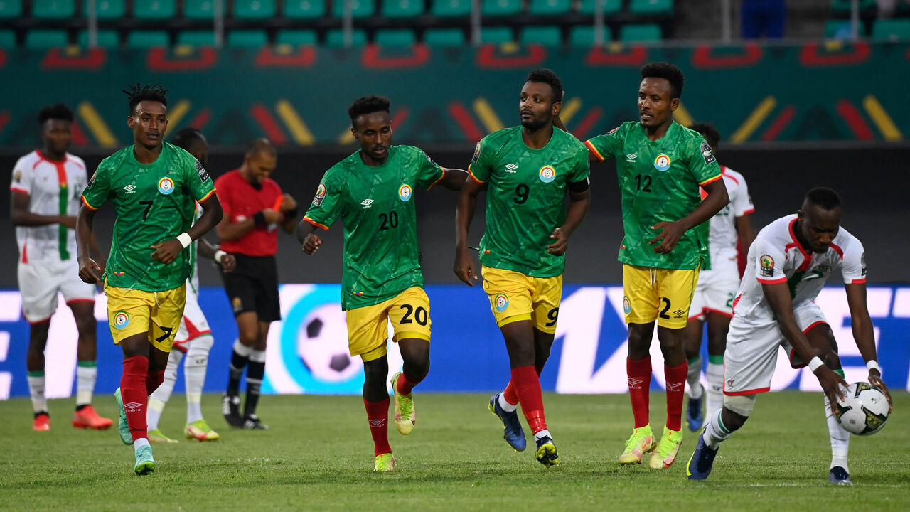 Ethiopia's midfielder Surafel Dagnachew, defender Ramadan Yusef, forward Getaneh Kebede and midfielder Yehun Endeshaw run on the field during the Group A Africa Cup of Nations 2021 soccer match between Burkina Faso and Ethiopia, Kouekong Stadium, Bafoussam, Cameroon, Jan. 17, 2022.