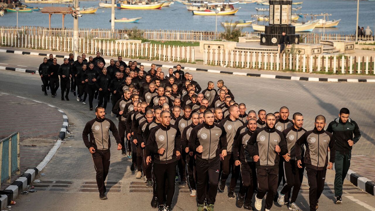 Palestinian cadets of al-Rebat College for Law and Police Science take part in morning exercises in Gaza city on Feb. 21, 2022.