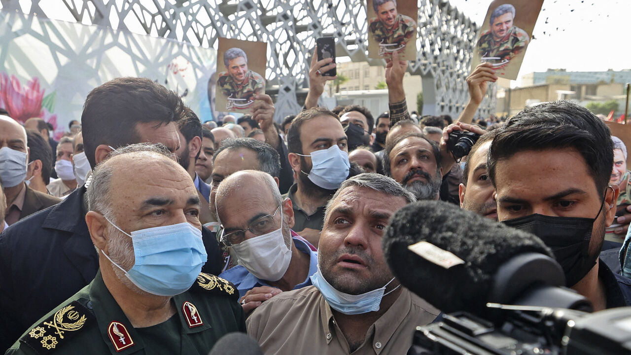 Hossein Salami, head of Iran's Revolutionary Guard Corps (IRGC), takes part in Revolutionary Guards Col. Sayyad Khodai's funeral procession.