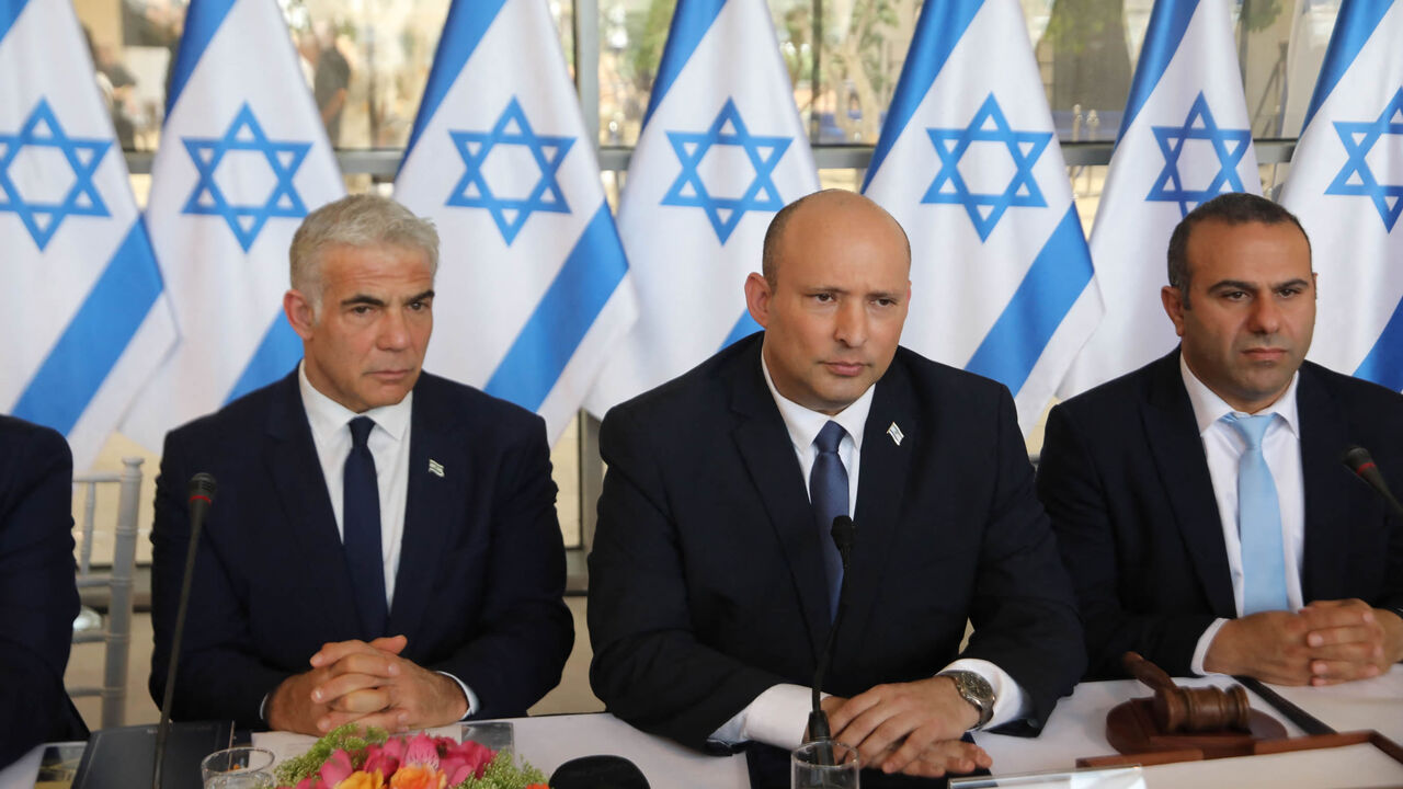 Israeli Foreign Minister Yair Lapid, Prime Minister Nafrali Bennet and Knesset member Abir Kara attend a weekly Cabinet meeting, Jerusalem, May 29, 2022.