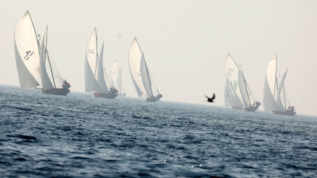 Sailors take part in the al-Gaffal long-distance dhow race near Sir Bu Nair island in the UAE's waters Sailors take part in the al-Gaffal long-distance dhow race near Sir Bu Nair island in the UAE's waters