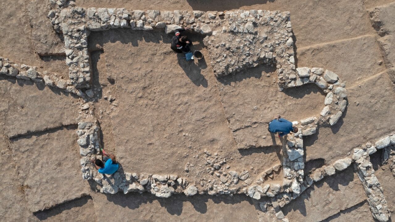 An aerial view shows Palestinian workers of Israel's Antiquities Authority at the recently discovered ancient mosque