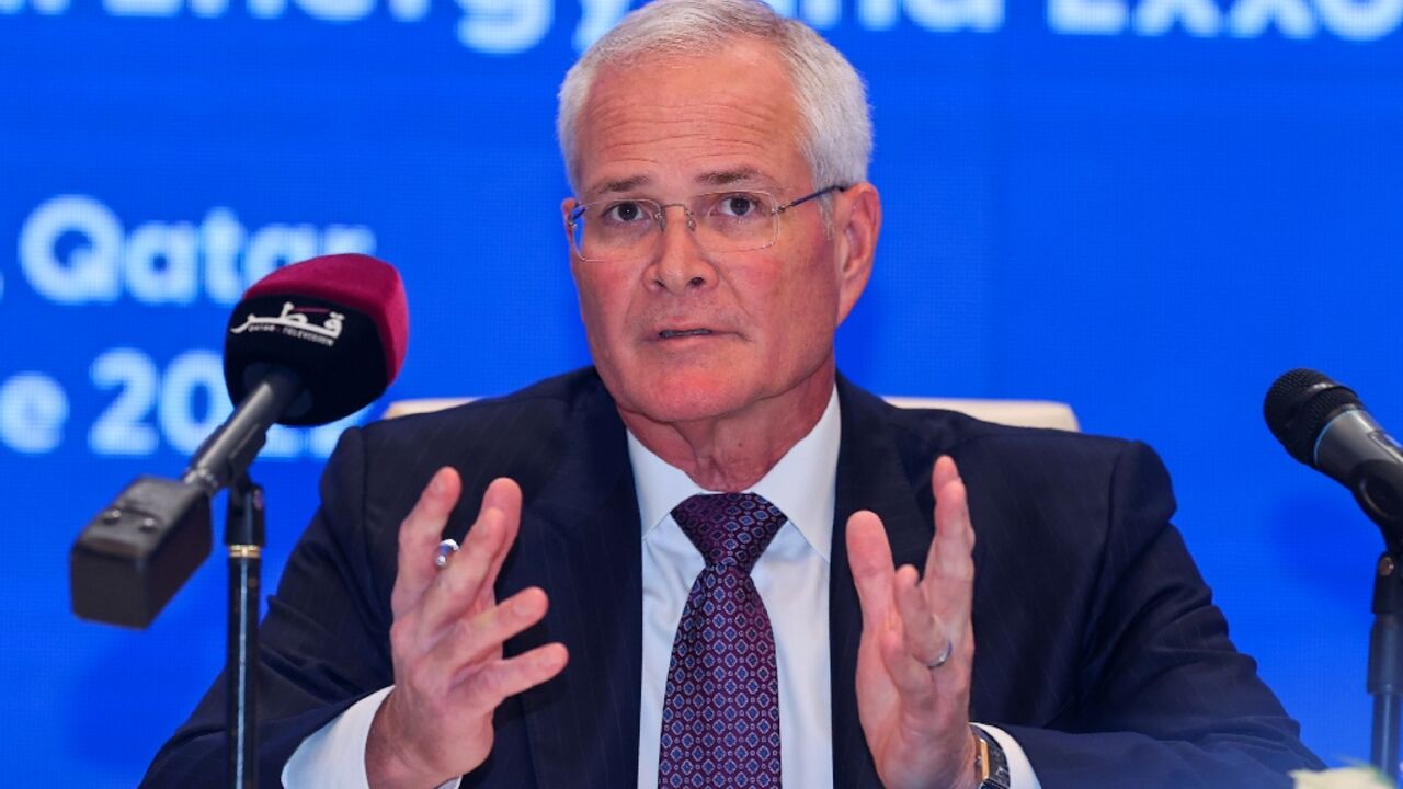 Exxon Mobil Corporation's Chairman and CEO Darren Woods speaks during a press conference and signing ceremony at QatarEnergy headquarters in Doha, on June 21, 2022