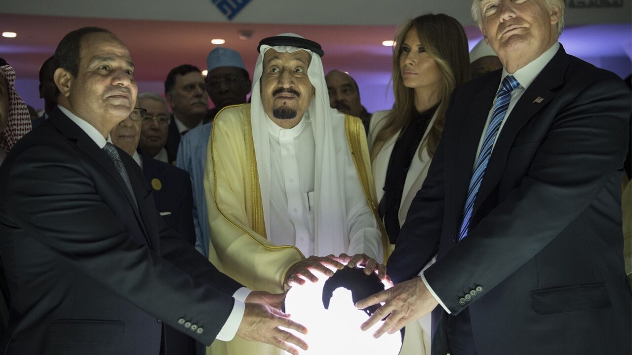 US President Donald Trump (R), Egyptian President Abdel Fattah el-Sisi (L) and Saudi Arabia's King Salman bin Abdulaziz al-Saud pose at the opening of a Riyadh-based centre to combat extremist ideology in May 2017 US President Donald Trump (R), Egyptian President Abdel Fattah el-Sisi (L) and Saudi Arabia's King Salman bin Abdulaziz al-Saud pose at the opening of a Riyadh-based centre to combat extremist ideology in May 2017