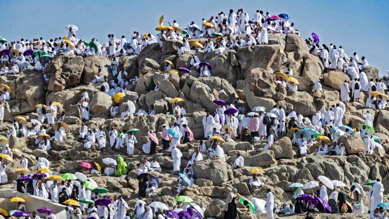 Muslim pilgrims gather atop Mount Arafat, southeast of the holy city of Mecca Muslim pilgrims gather atop Mount Arafat, southeast of the holy city of Mecca