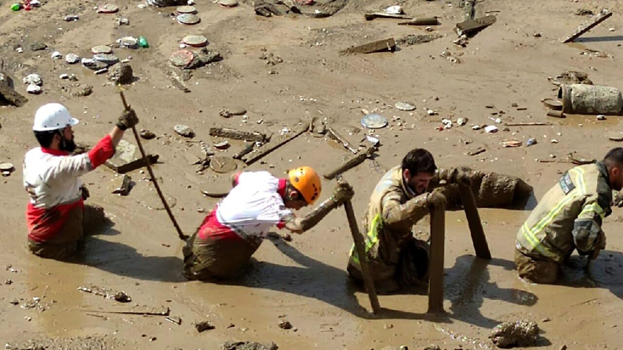 At least six people were killed in floods near Tehran most in a landslide that dumped mud four metres deep in a village west of the capital