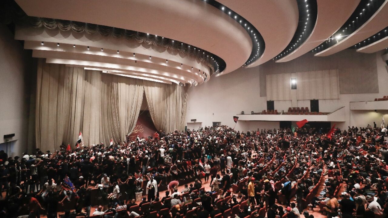 It is the second time in days that Sadr supporters have forced their way into Iraq's legislative chamber It is the second time in days that Sadr supporters have forced their way into Iraq's legislative chamber