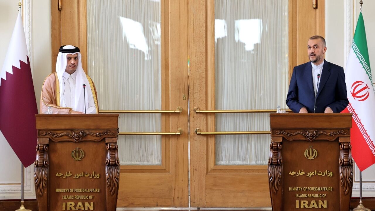 Iran's Foreign Minister Hossein Amir-Abdollahian (R) and Qatar's Foreign Minister Mohammed bin Abdulrahman bin Jassim Al-Thani at a joint press conference in Tehran