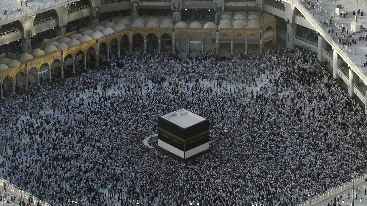 The Kaaba is a large black cubic structure at the centre of Mecca's Grand Mosque towards which Muslims turn to pray wherever they are in the world The Kaaba is a large black cubic structure at the centre of Mecca's Grand Mosque towards which Muslims turn to pray wherever they are in the world