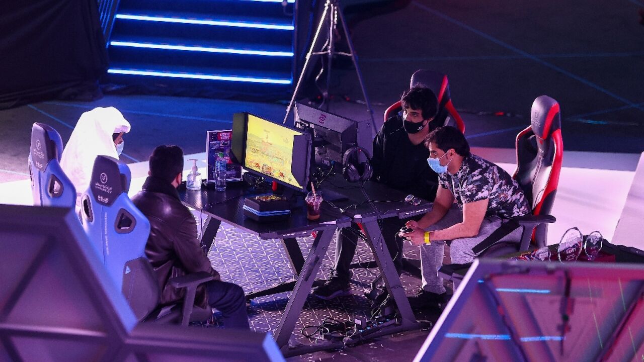 Esport athletes compete during Virtuocity Smash Open 2022 at the Doha Festival City in the Qatari capital Esport athletes compete during Virtuocity Smash Open 2022 at the Doha Festival City in the Qatari capital