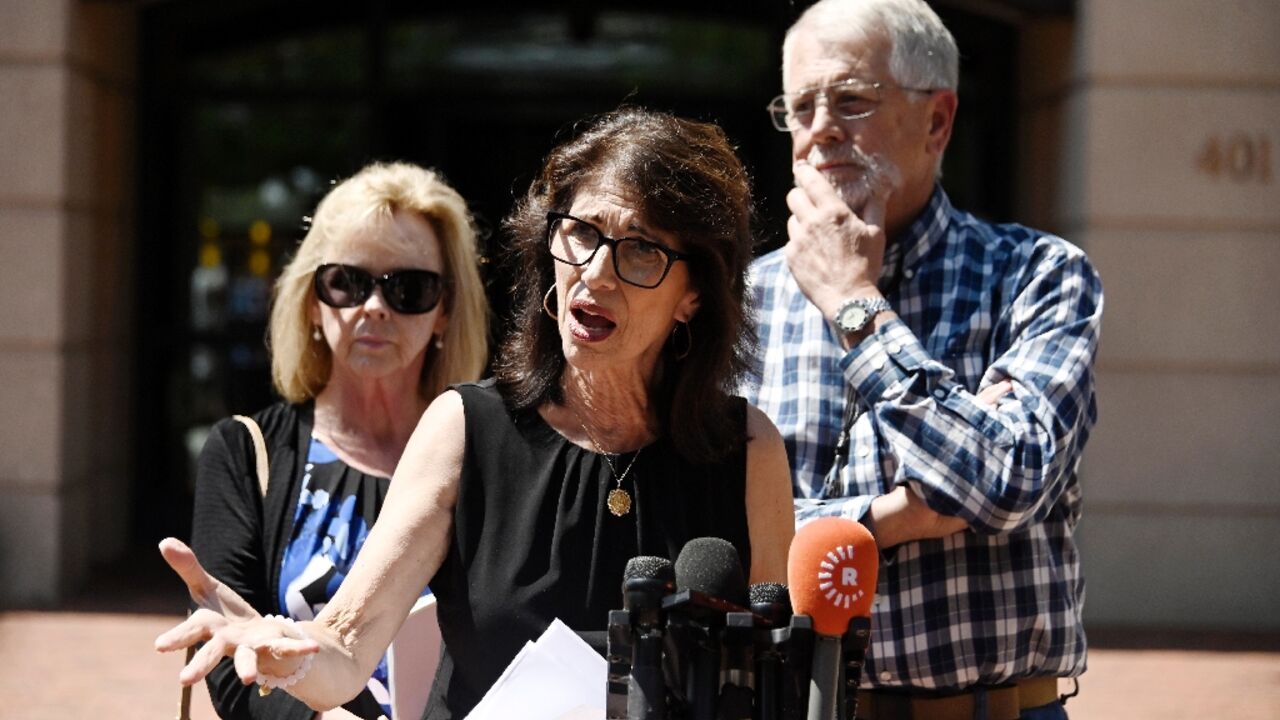 Diane Foley (C), the mother of James Foley, and Carl and Marsha Mueller, the parents of Kayla Mueller, speak to reporters outside the Albert V. Bryan Federal Courthouse following the sentencing of former Islamic State 'Beatle' El Shafee Elsheikh Diane Foley (C), the mother of James Foley, and Carl and Marsha Mueller, the parents of Kayla Mueller, speak to reporters outside the Albert V. Bryan Federal Courthouse following the sentencing of former Islamic State 'Beatle' El Shafee Elsheikh