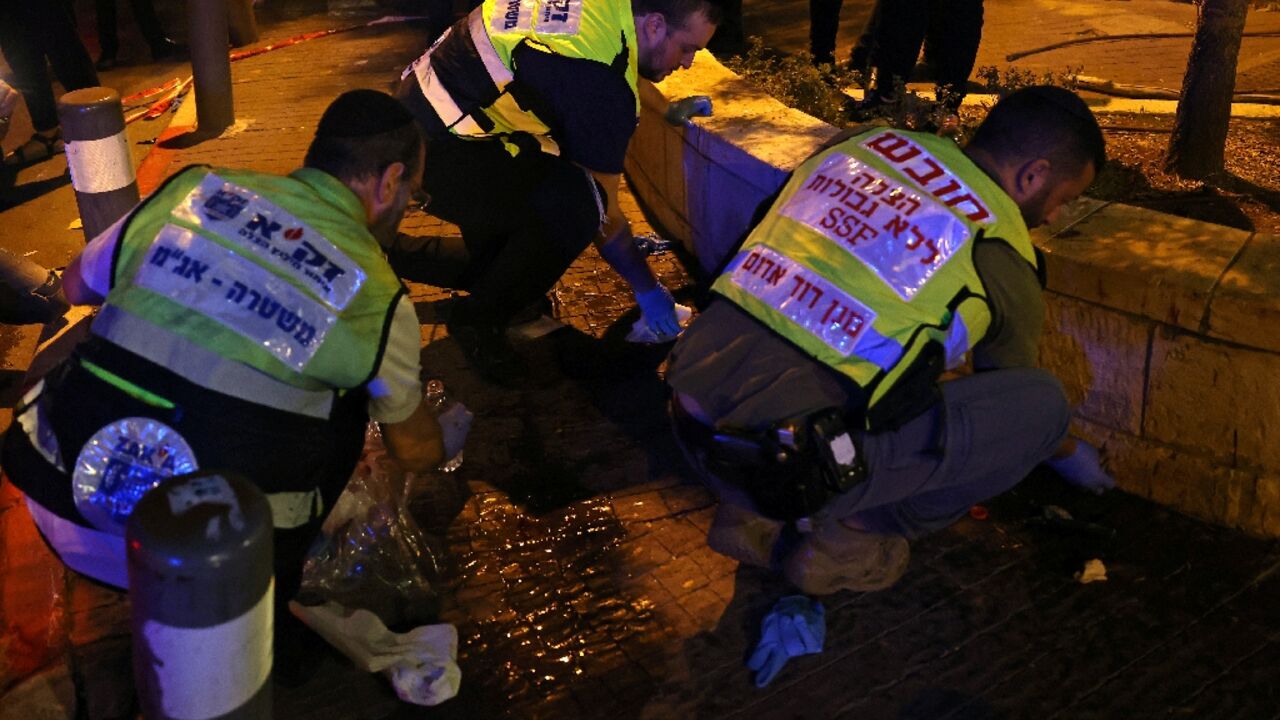 Zaka volunteers, an ultra-Orthodox Jewish emergency response team, clean up blood stains after the attack Zaka volunteers, an ultra-Orthodox Jewish emergency response team, clean up blood stains after the attack