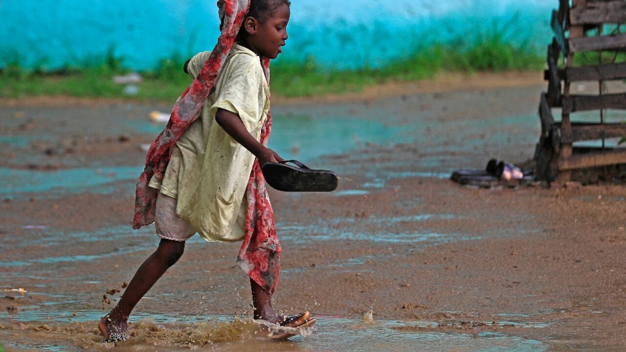 A girl in Sudan's Blue Nile at a camp for displaced people: some 31,000 people from both sides forced to flee their homes