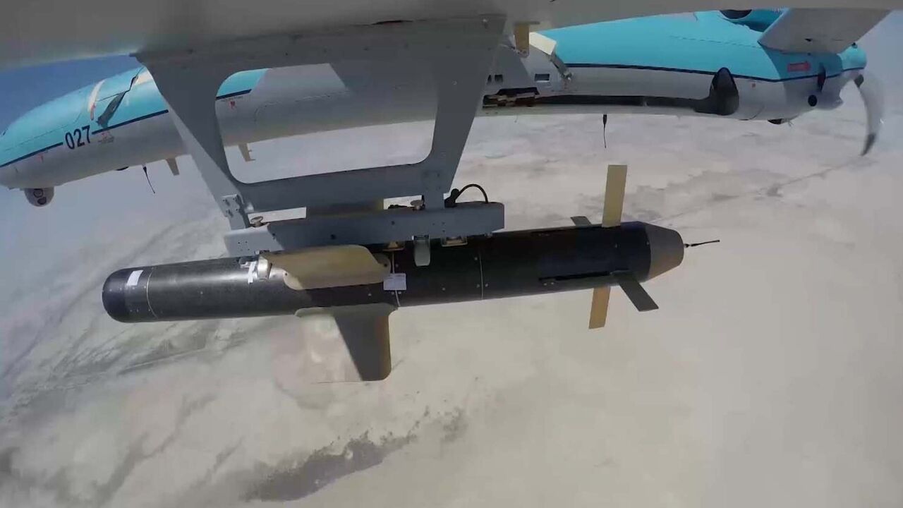 A handout picture provided by the Iranian army's official website on Sept. 11, 2020, shows an Iranian Simorgh drone carrying a weapon. 