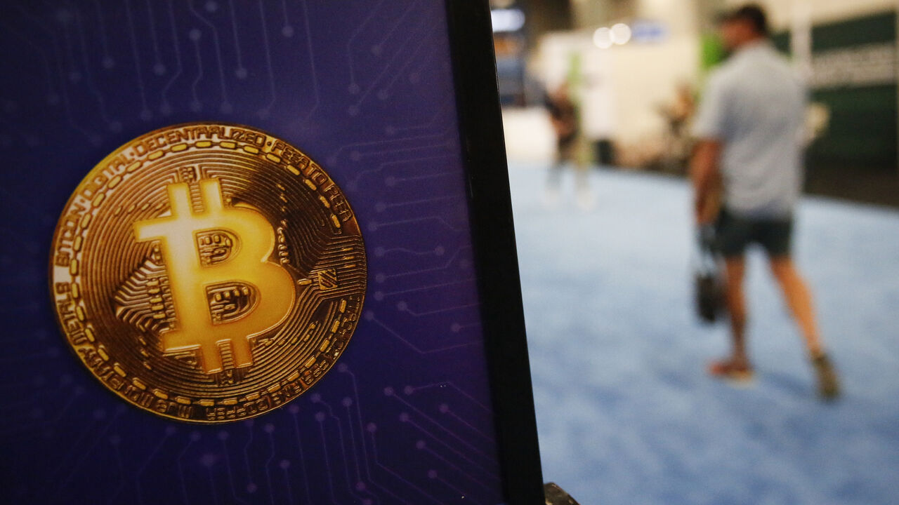 MIAMI, FLORIDA - APRIL 8: A bitcoin logo is seen during the Bitcoin 2022 Conference at Miami Beach Convention Center on April 8, 2022 in Miami, Florida. The worlds largest bitcoin conference runs from April 6-9, expecting over 30,000 people in attendance and over 7 million live stream viewers worldwide.(Photo by Marco Bello/Getty Images)