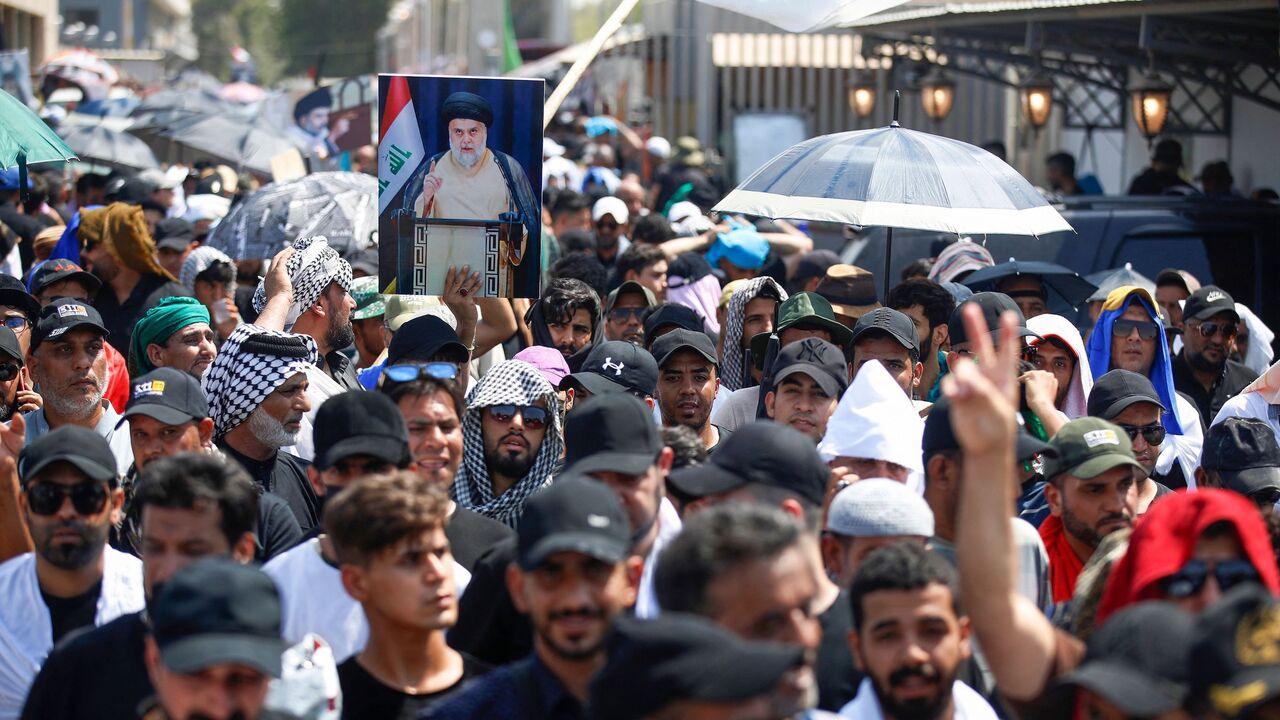 Supporters of Shiite cleric Muqtada al-Sadr gather outside the Iraqi parliament in the Green Zone in the capital Baghdad, on the seventh day of protests against the nomination of a rival Shiite faction for the position of prime minister in the heavily-guarded Green Zone, on Aug. 5, 2022.