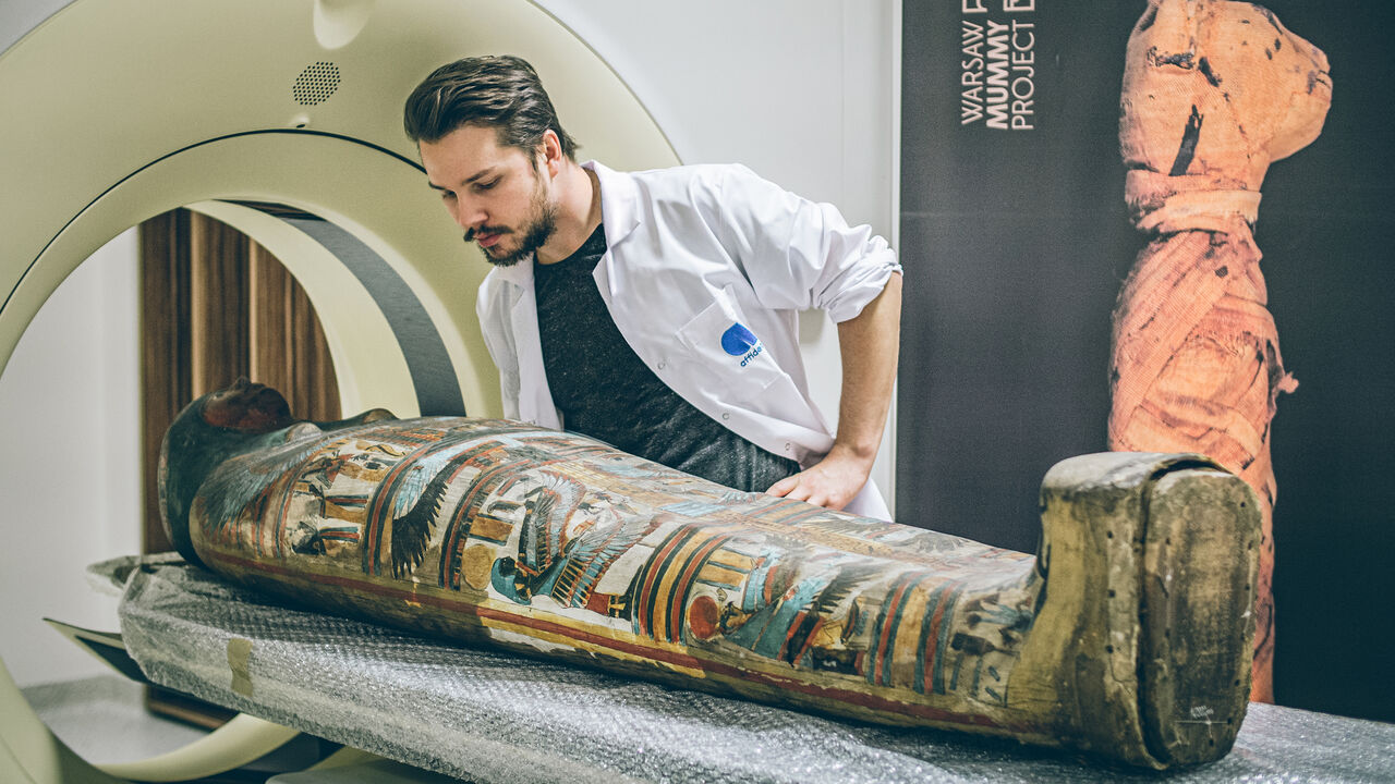 The mummy of a pregnant woman from ancient Egypt is prepared for a CT scan, Affidea clinic, Otwock, Poland, 2015.