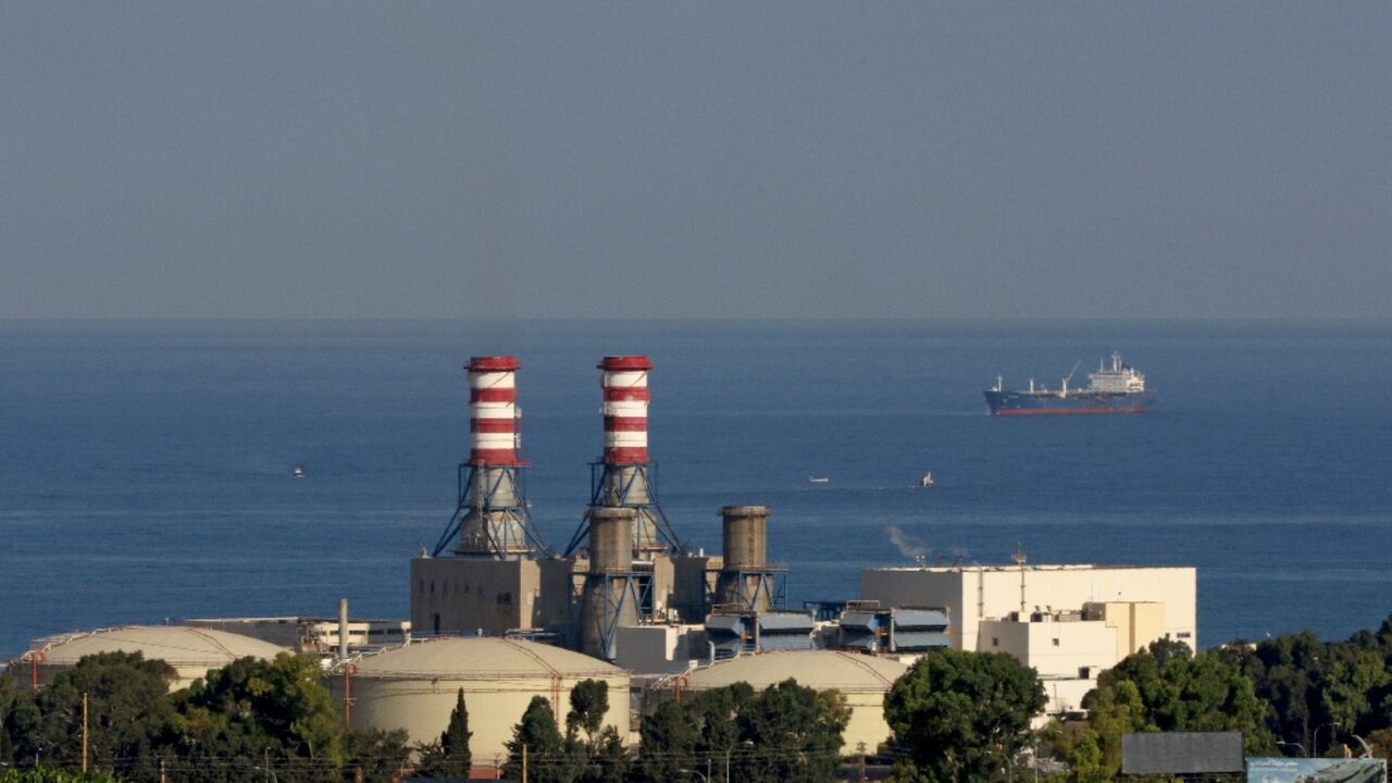 A tanker carrying fuel oil from Iraq is anchored off the Zahrani power plant near the southern Lebanese city of Sidon (Saida) on September 18, 2021 A tanker carrying fuel oil from Iraq is anchored off the Zahrani power plant near the southern Lebanese city of Sidon (Saida) on September 18, 2021