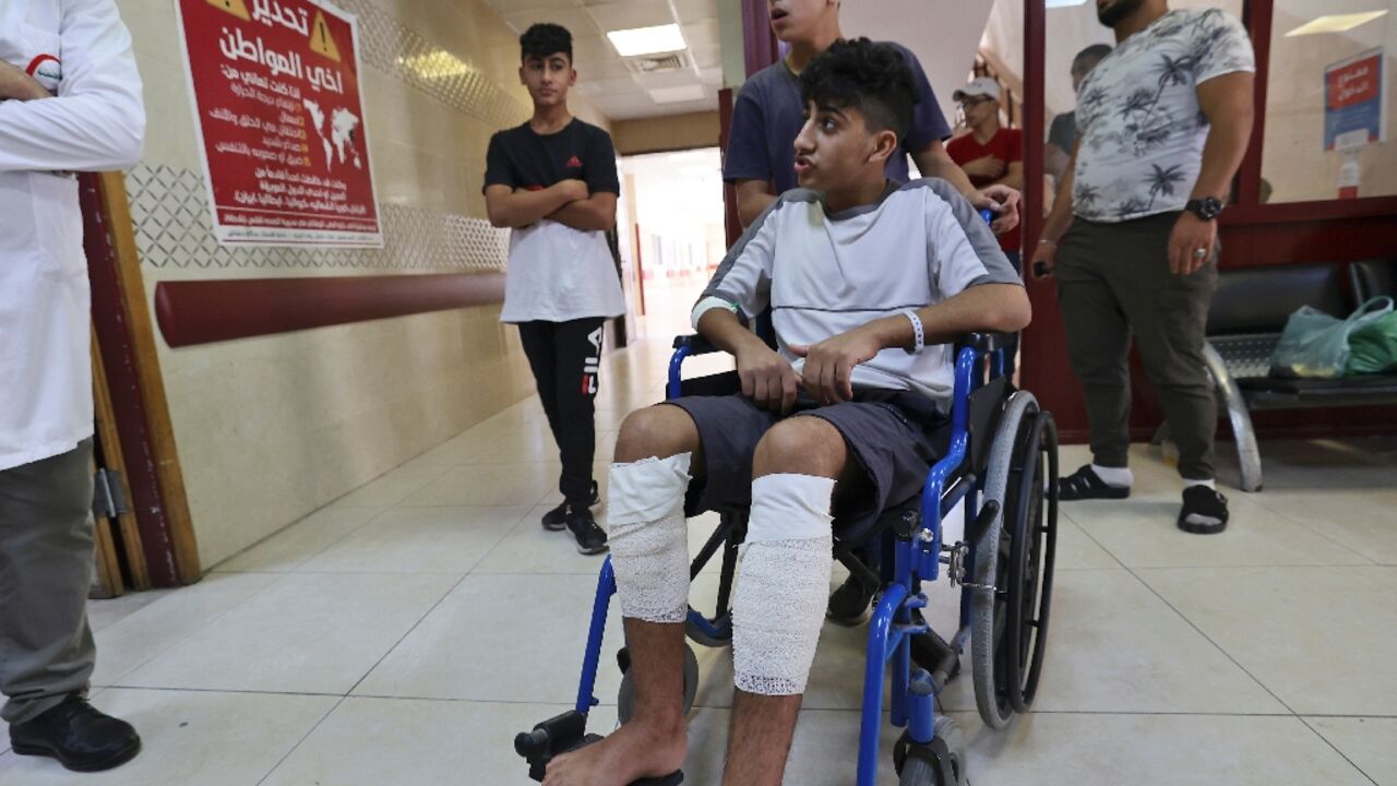 A wounded Palestinian youth is treated at Rafidia Surgical Hospital in the West Bank city of Nablus