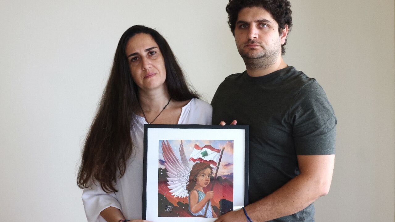 Paul and Tracy Naggear hold a framed drawing for their late daughter Alexandra, who was killed in the Beirut port blast of August 2020 Paul and Tracy Naggear hold a framed drawing for their late daughter Alexandra, who was killed in the Beirut port blast of August 2020