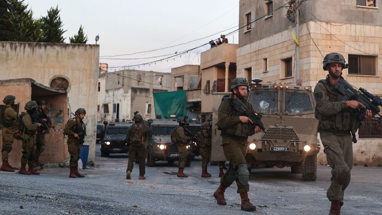 Israeli soldiers deploy to demolish houses in Rummanah town in the occupied West Bank