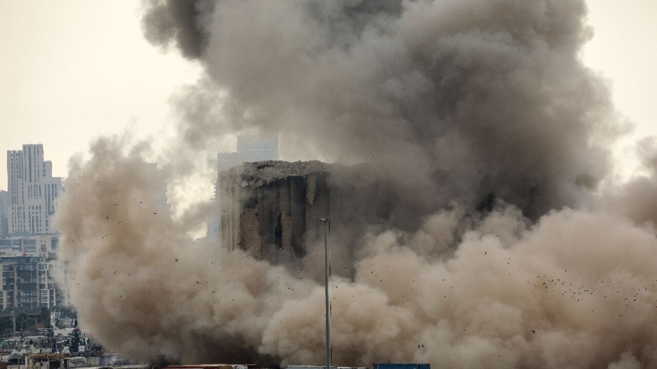 Beirut's heavily damaged harbourside grain silos have become a grim reminder of the explosion, and the collapse of part of the structure Thursday dramatically brought back the trauma Beirut's heavily damaged harbourside grain silos have become a grim reminder of the explosion, and the collapse of part of the structure Thursday dramatically brought back the trauma
