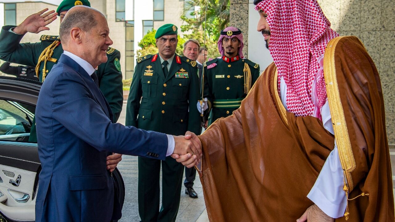 Saudi Crown Prince Mohammed bin Salman (R) shakes hands with Germany's Chancellor Olaf Scholz at al-Salam Palace in the Red Sea coastal city of Jeddah Saudi Crown Prince Mohammed bin Salman (R) shakes hands with Germany's Chancellor Olaf Scholz at al-Salam Palace in the Red Sea coastal city of Jeddah