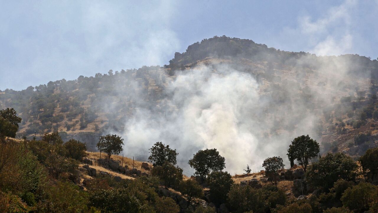 Smoke billows following an Iranian cross-border attack in the area of Zargwez.