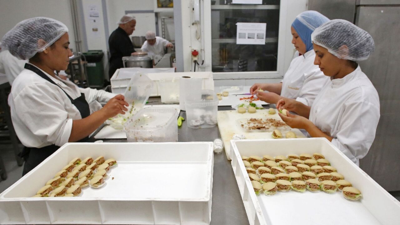 Employees of the Tunisian patisserie chain Gourmandise 