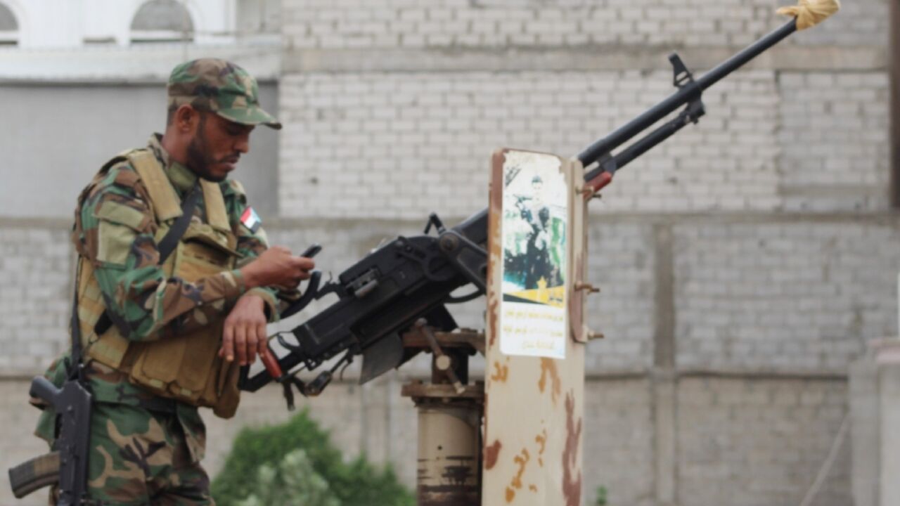 In this file photo taken on January 13, 2020, a member of Yemen's Security Belt forces stands guard during a meeting of the Southern Transitional Council (STC) in the southern city of Aden In this file photo taken on January 13, 2020, a member of Yemen's Security Belt forces stands guard during a meeting of the Southern Transitional Council (STC) in the southern city of Aden