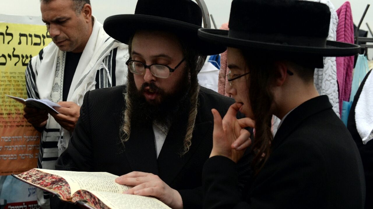 A file picture from September 13, 2015 shows ultra-Orthodox Jews pray in the Ukrainian city of Uman 