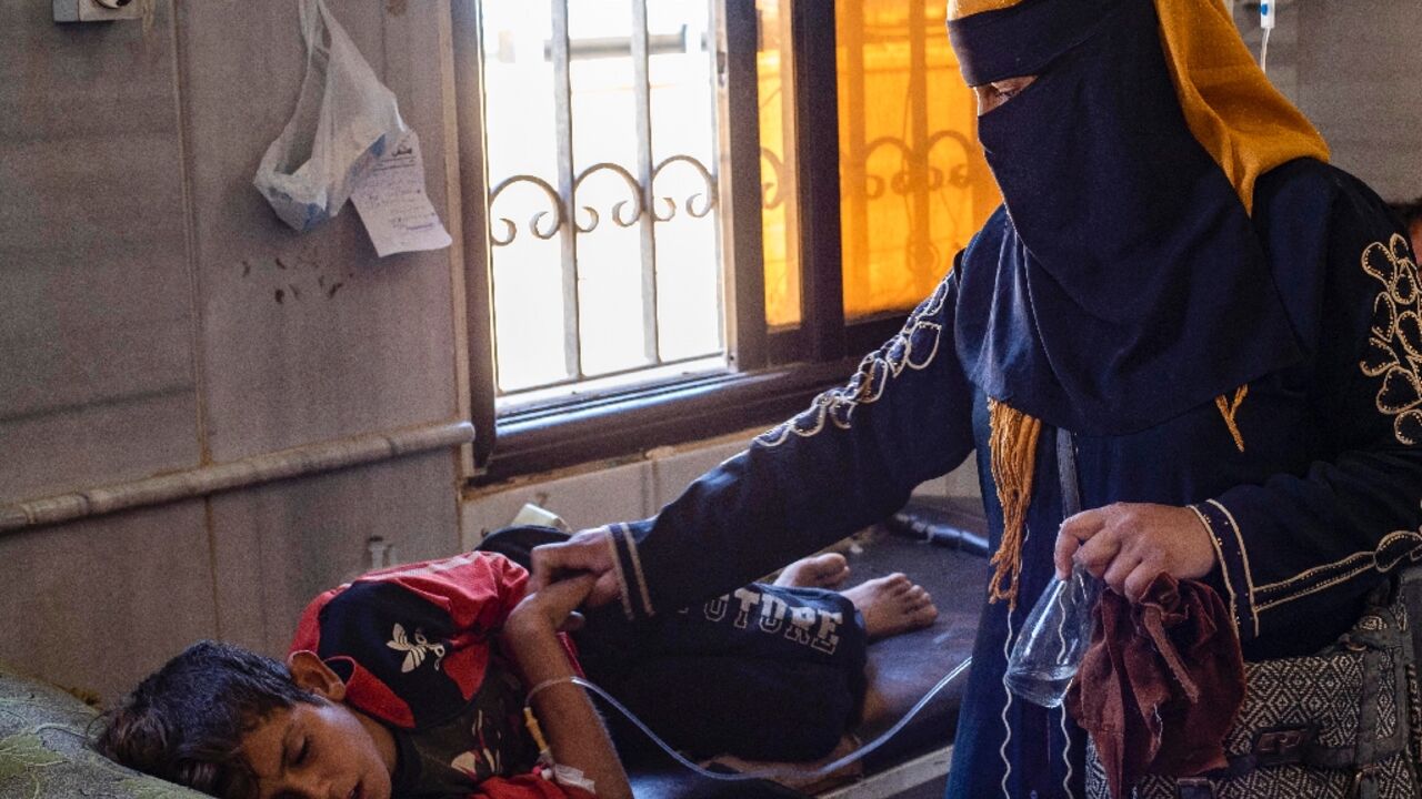 A child suffering from cholera receives treatment at the Al-Kasrah hospital in Syria's eastern province of Deir Ezzor on September 17 A child suffering from cholera receives treatment at the Al-Kasrah hospital in Syria's eastern province of Deir Ezzor on September 17