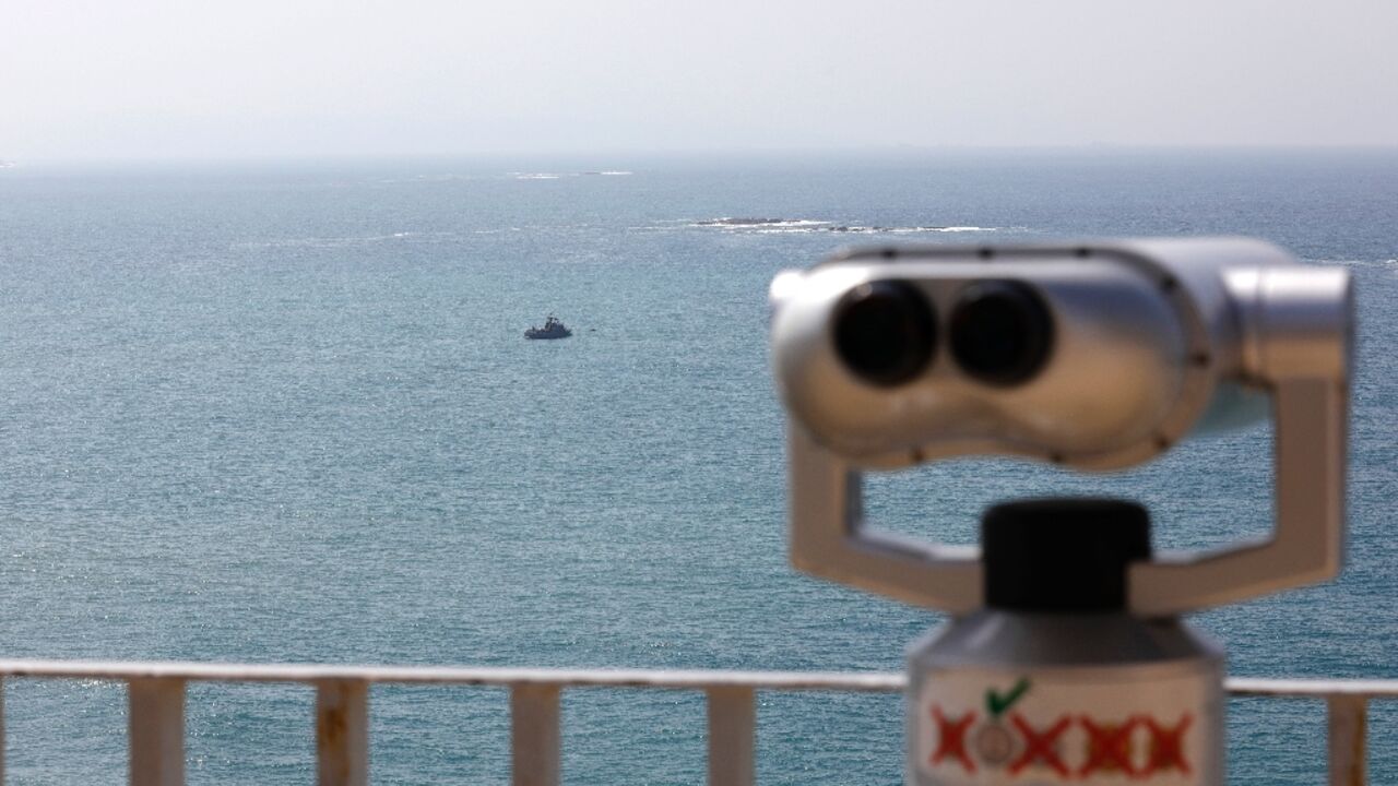 Israeli Navy vessels patrol Mediterranean waters off Israel's crossing at Rosh Hanikra, known in Lebanon as Ras al-Naqura, a border area between the two coutries on October 4 Israeli Navy vessels patrol Mediterranean waters off Israel's crossing at Rosh Hanikra, known in Lebanon as Ras al-Naqura, a border area between the two coutries on October 4