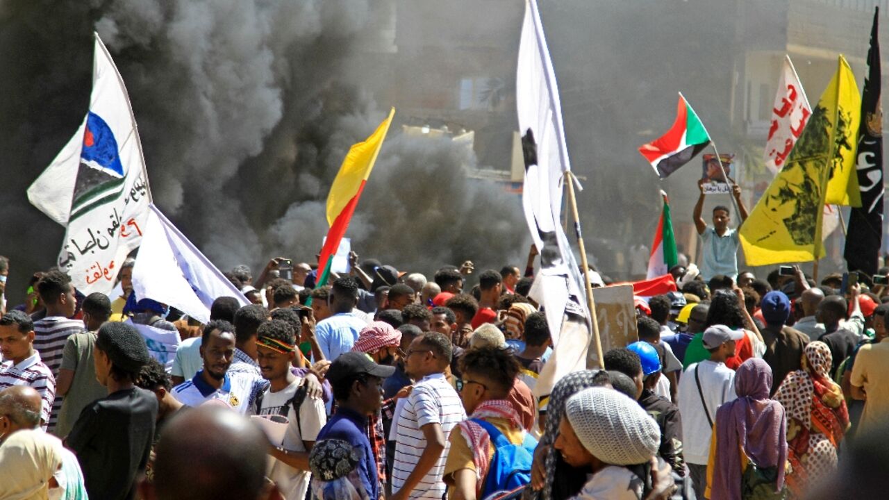 Protesters march in the Bashdar area of Sudan's capital Khartoum on Tuesday's first anniversary of the military coup