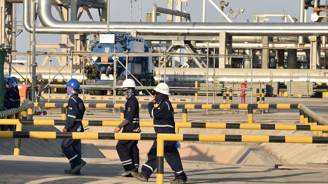 Employees of Aramco oil company work in Saudi Arabia's Abqaiq oil processing plant on Sept. 20, 2019.