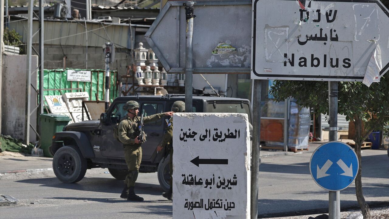 Israeli security forces deploy in the Deir Sharaf area.