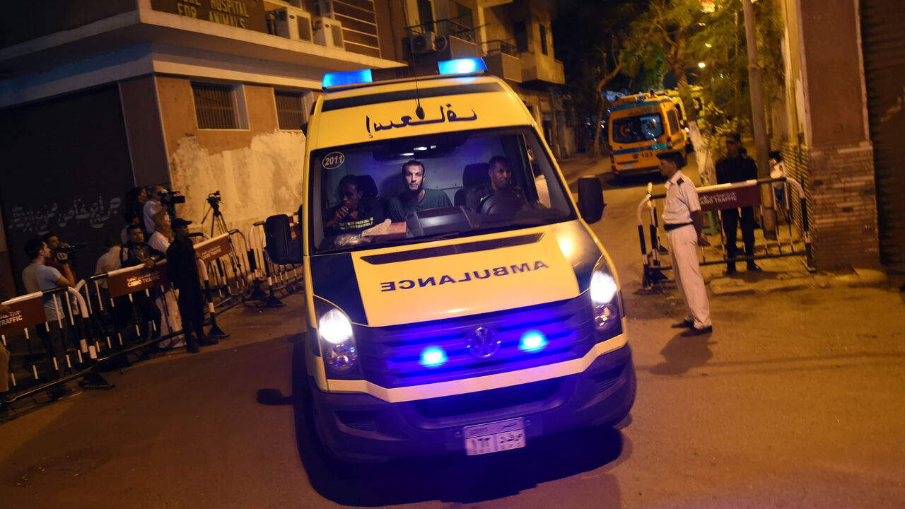 Ambulances carrying the bodies of victims of the A321 Russian airliner that crashed in Wadi al-Zolomat, a mountainous area in the Sinai Peninsula, leave the Zeinhom morgue to Cairo airport, Egypt, Nov. 1, 2015.