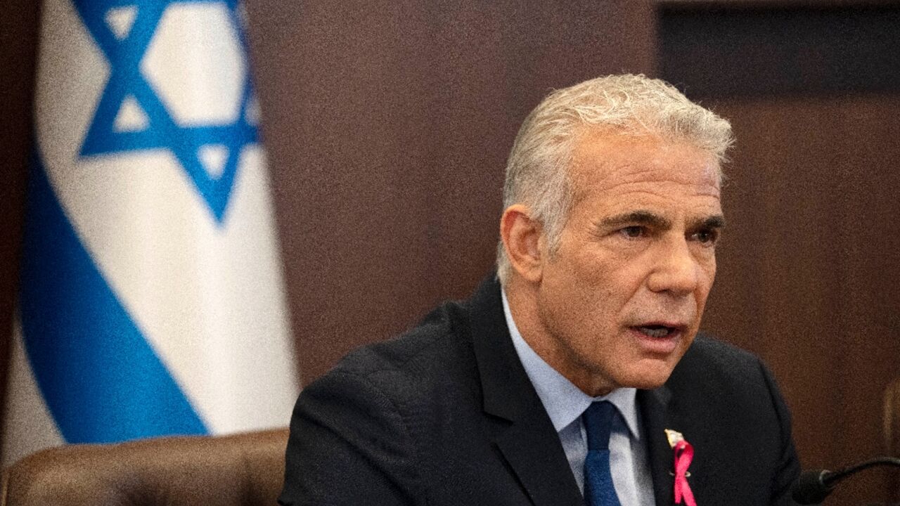 Israeli Prime Minister Yair Lapid opens his weekly cabinet meeting in Jerusalem on Sunday