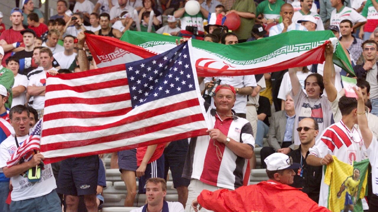 Iranian and US supporters attend the 1998 World Cup; the two sides meet agains at the 2022 tournament on Tuesday