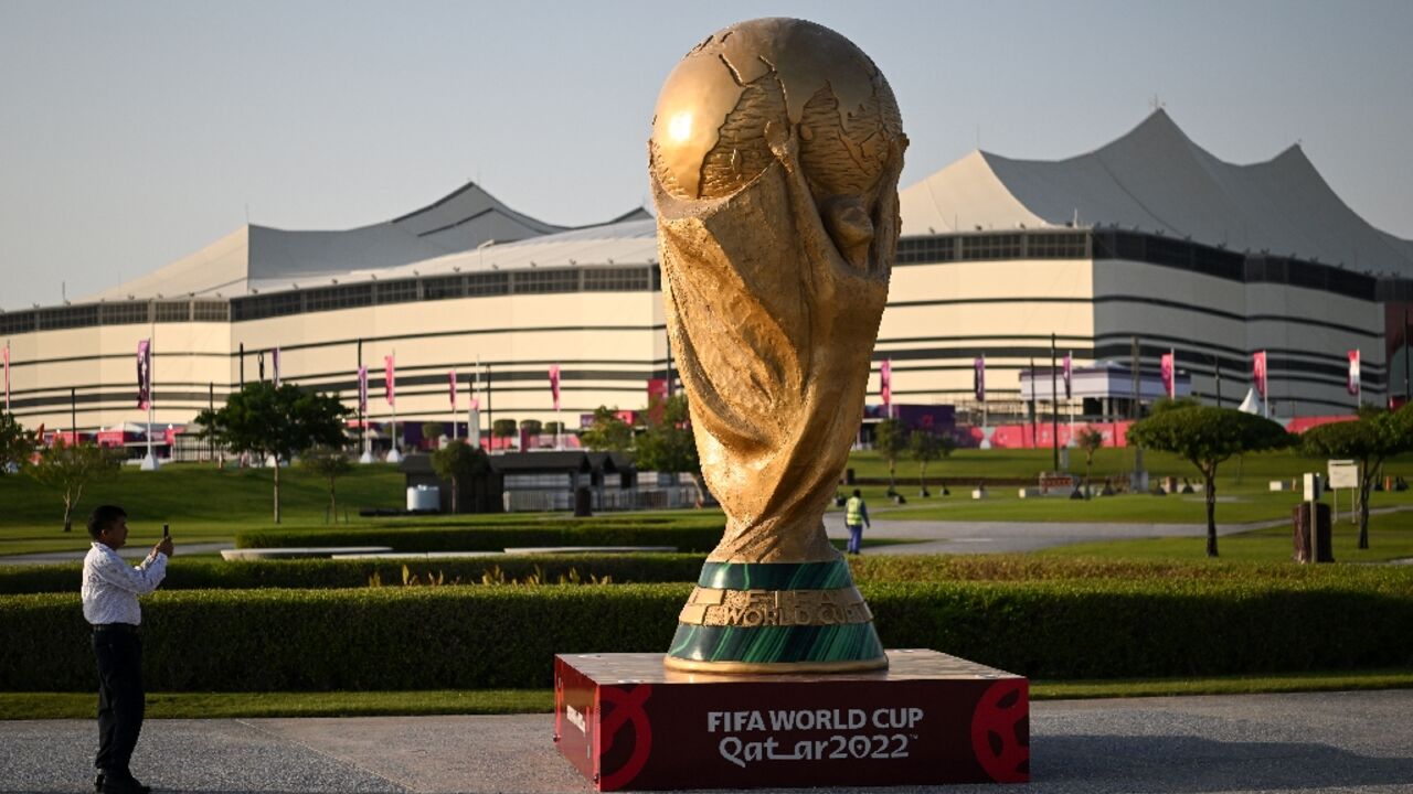 A giant replica of the World Cup trophy stands in front of the Al-Bayt Stadium where the tournament kicks off on November 20